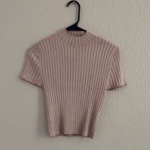 pink short sleeve knit top with gold sparkles